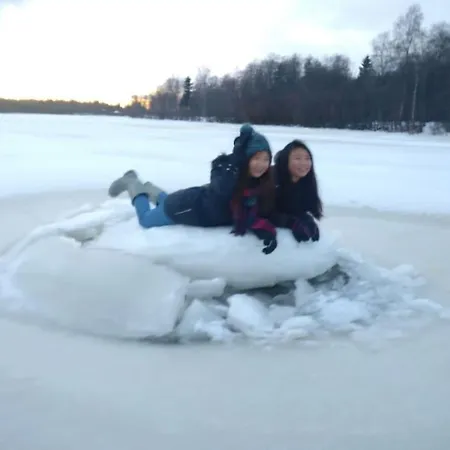 Backyard With Veranda By River In Keminmaa Apartment Kemi